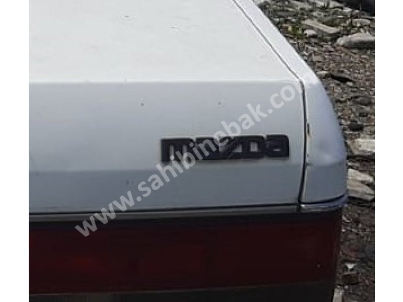 1988 mazda 323 1.6 çıkma marka model yazısı