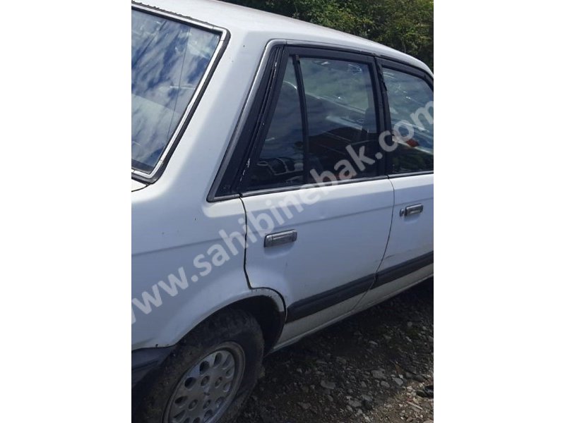 1988 mazda 323 1.6 çıkma sağ arka dolu kapı