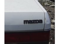 1988 mazda 323 1.6 çıkma marka model yazısı